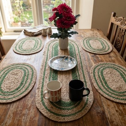 Oval jute table runner and placemats with green trim